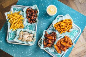 Wingstop opens fourth site in Manchester