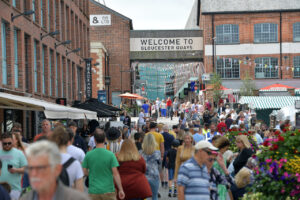 Macron signs at Gloucester Quays ahead of Summer of Sport activation